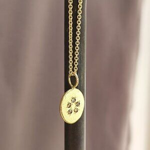 Gold diamond necklace. 14k Yellow gold pendant with 5 small Green Brown diamonds